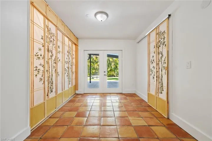 Laundry & flex room shoji doors to backyard