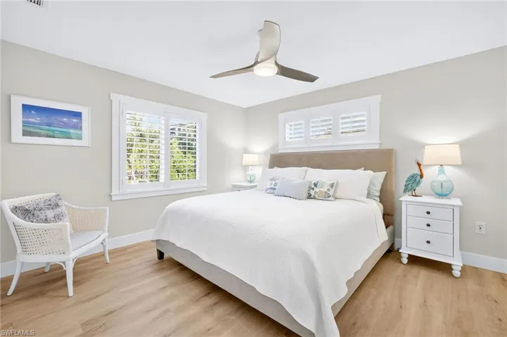 Bedroom with light wood-type flooring and ceiling fan