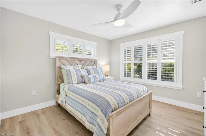 Bedroom featuring light wood-style floors and ceiling fan