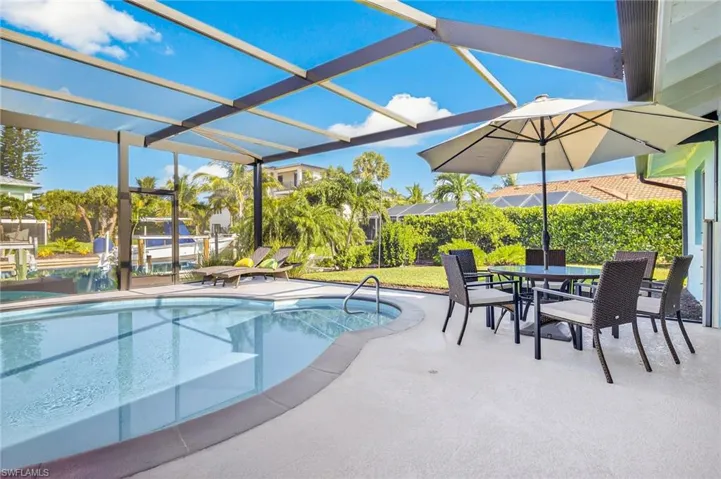 Swimming pool featuring a patio area and outdoor dining space