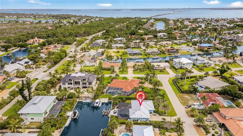 Aerial view of residential area with a nearby body of water