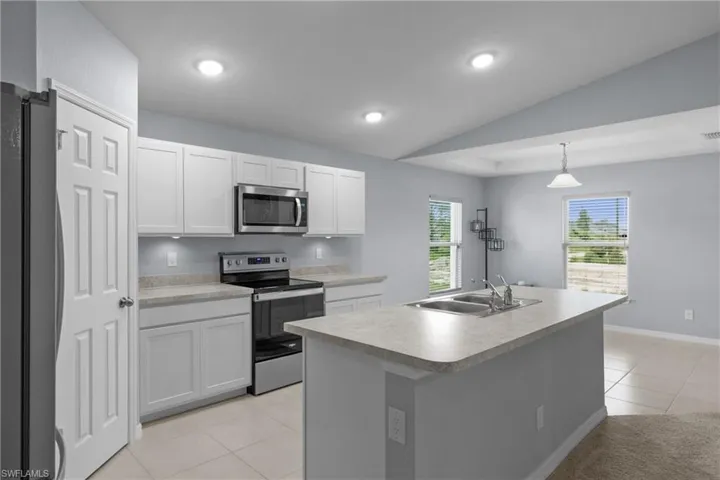 18" x 18" Tile Flooring in Kitchen & Dining Room