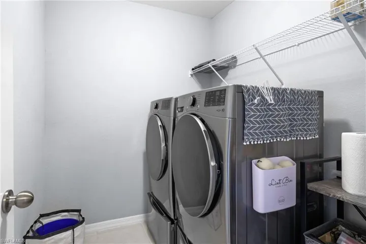 Expensive LG Thin IQ Washer & Dryer system in dedicated Laundry Room