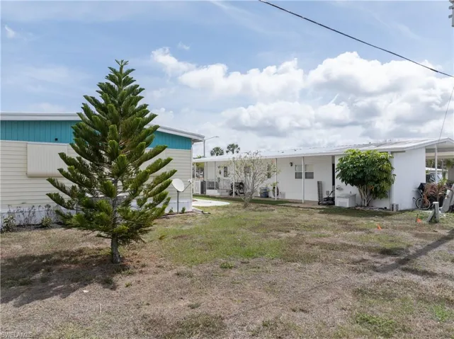 Back of property featuring a patio area