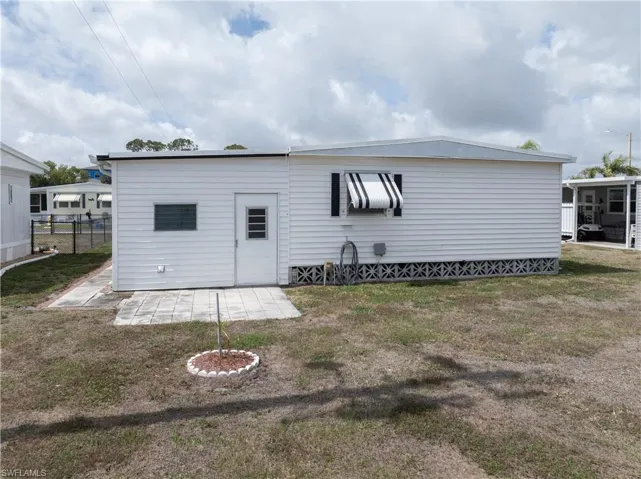 Rear view of property with a patio area