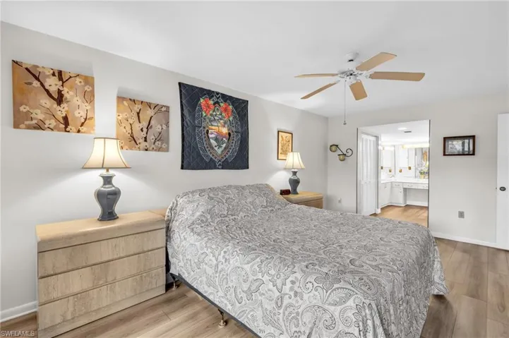 Bedroom suite with adjoining bathroom and walk in closet