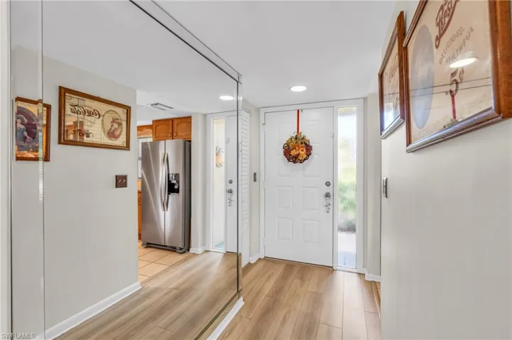 Foyer with new laminate wood-style floors