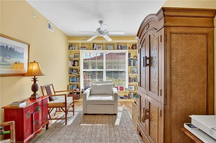 Sitting room featuring ceiling fan