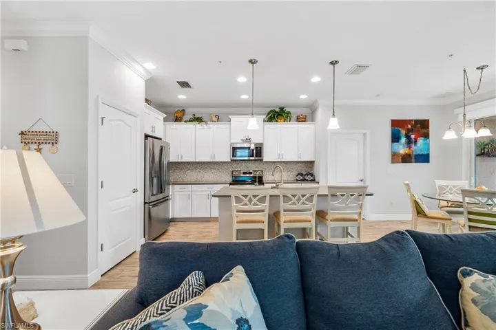 Open-concept living space featuring tile flooring throughout