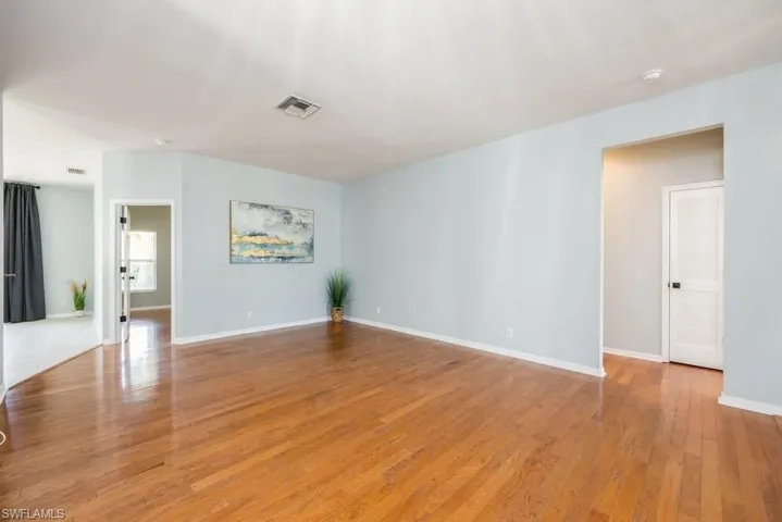 Spare room featuring light hardwood / wood-style floors