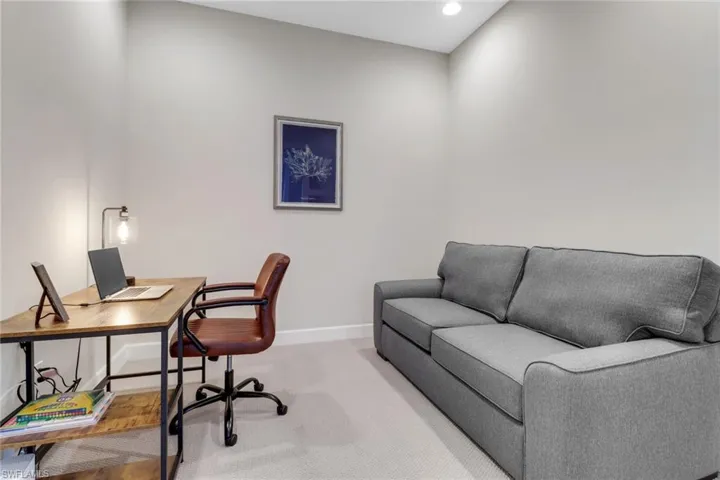 Office with recessed lighting, carpet, and baseboards