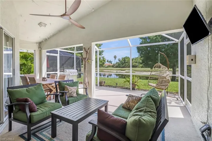 Screened in patio with Golf course and water view