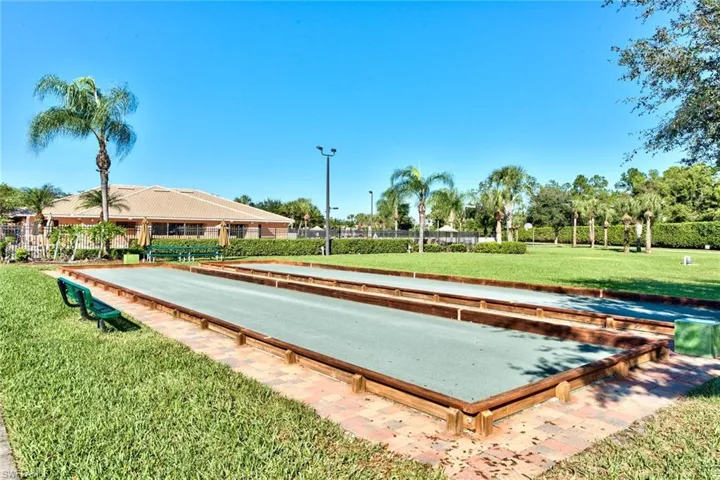 View of home's community featuring a yard