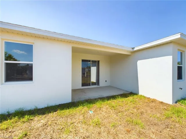 Back of property featuring a patio