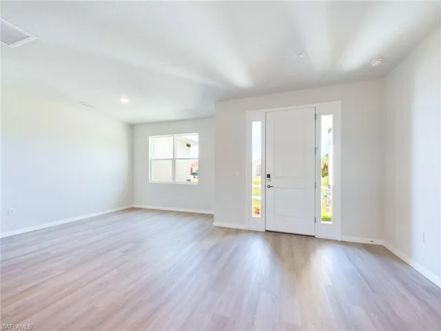 Foyer featuring light hardwood / wood-style flooring