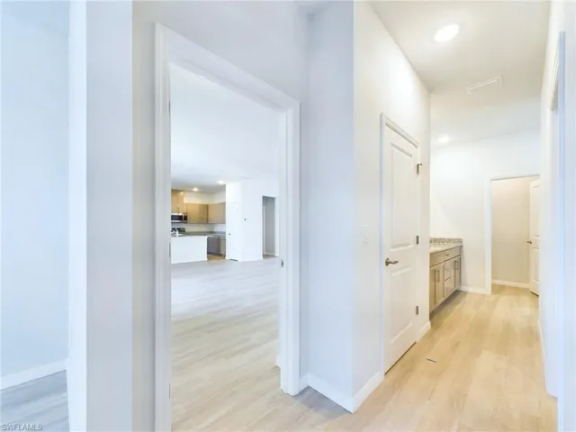Hall with light wood-type flooring