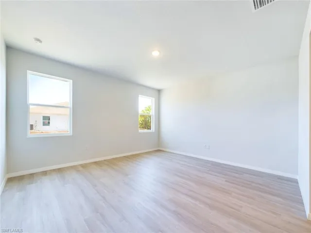 Spare room featuring light hardwood / wood-style flooring