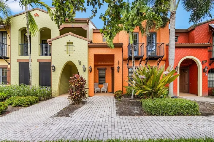 Mediterranean / spanish-style house featuring stucco siding and a tiled roof