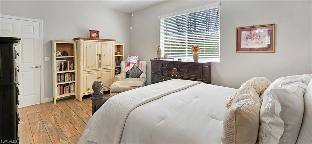 Bedroom with light wood-style floors