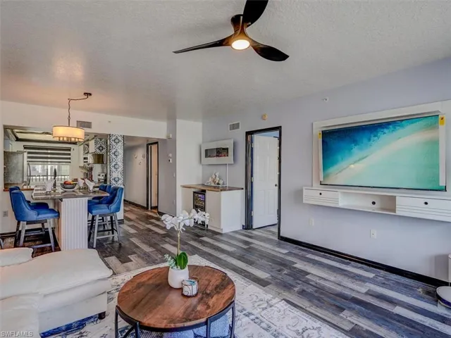 VIEW FROM LIVING AREA SHOWING ENTRANCE TO OWNER'S SUITE