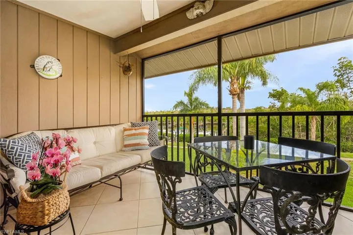 Screened Lanai looking at water and docks.