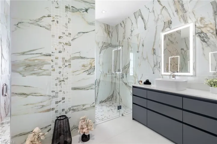 His and Hers Primary Bath vanity with lighted mirror