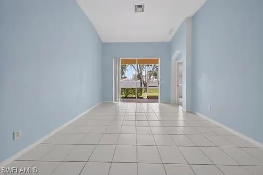 Tile flooring extending throughout the space
