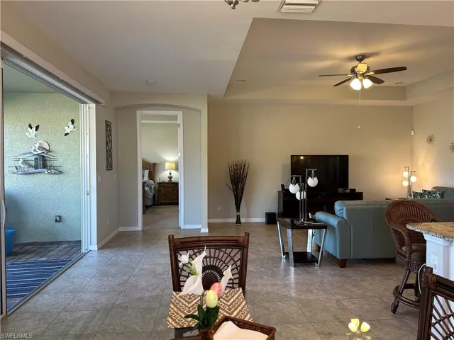Great room opens up to screened lanai (Three 8' sliders)