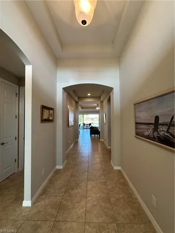 Opening on left is leading to bedrooms #2 and #3 separated by full Bathroom