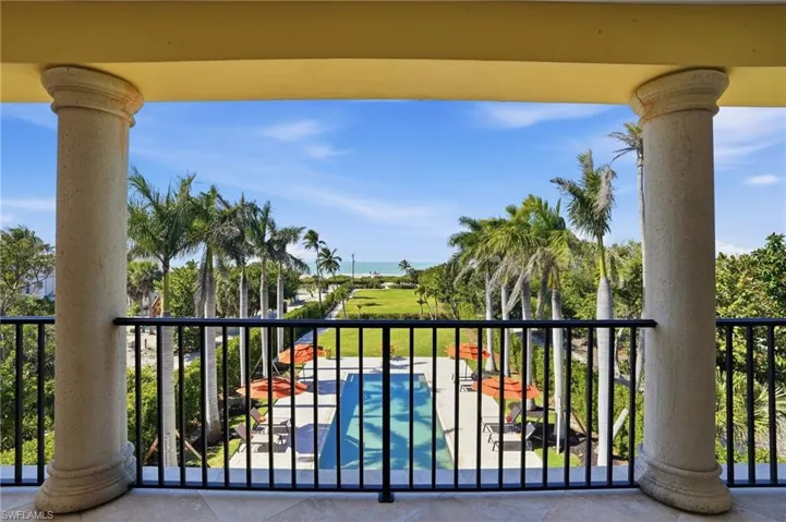 Balcony with view of pool area