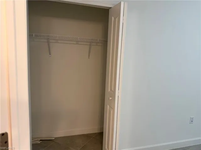 View of closet in Bedroom 1