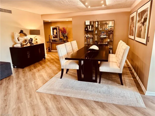 Dining area featuring light wood-type flooring