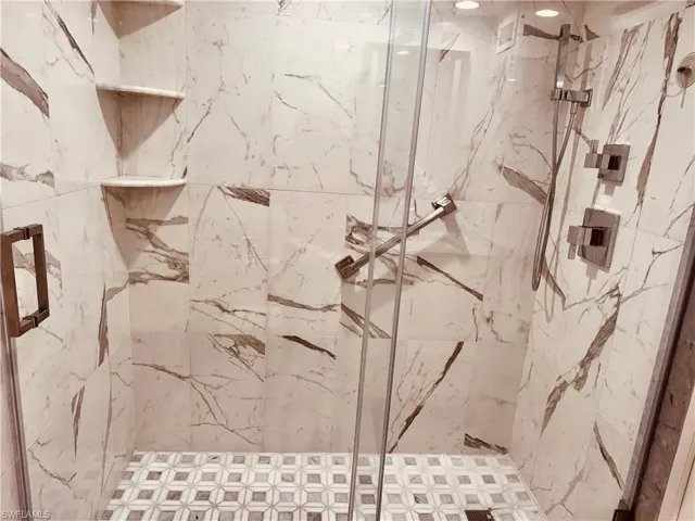 Bathroom featuring tiled shower