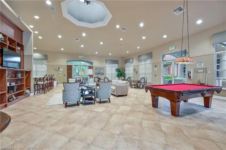Game room with billiards table and recessed lighting