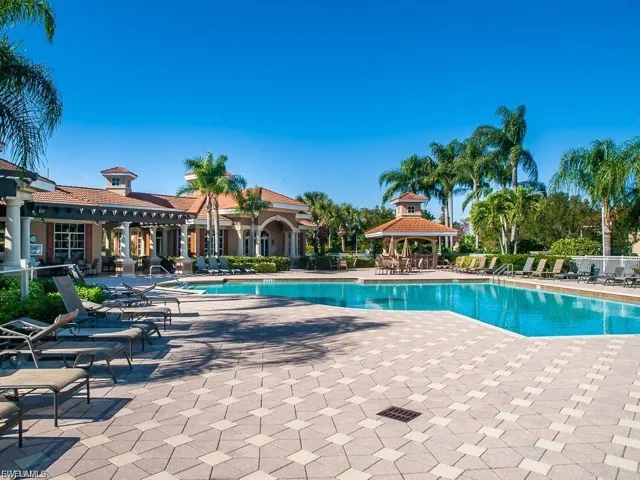Community pool featuring a patio and a gazebo
