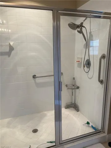 Full bath featuring a stall shower