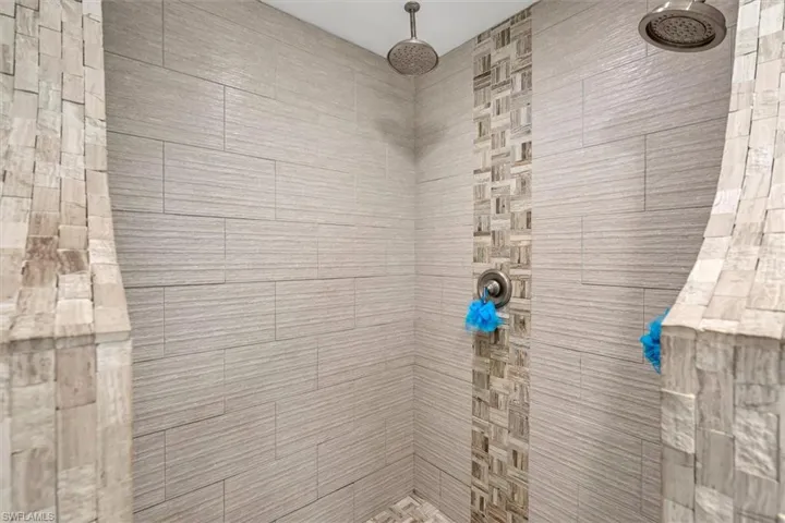Bathroom with tiled shower