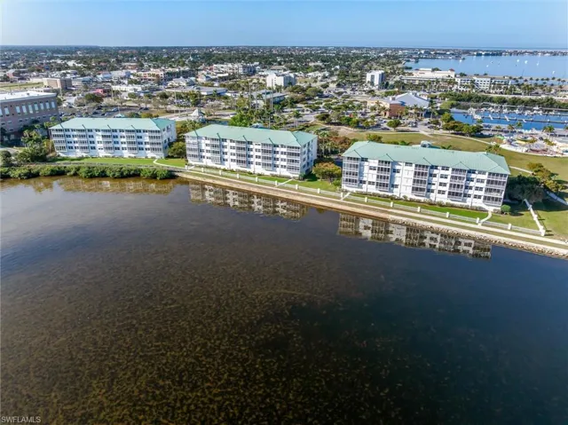 Aerial view of three Harbor Walk condo buildings