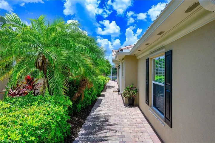 PAVER WALKWAY TO GLASS FRONT DOOR