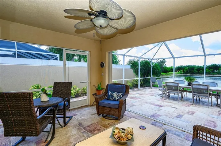 Private covered Lanai area with ceiling fan with water view