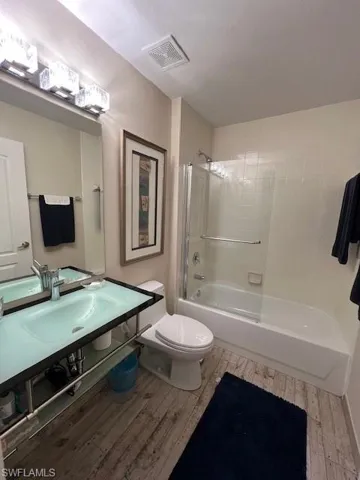 Guest Bath with new sink, lighting, tile floor