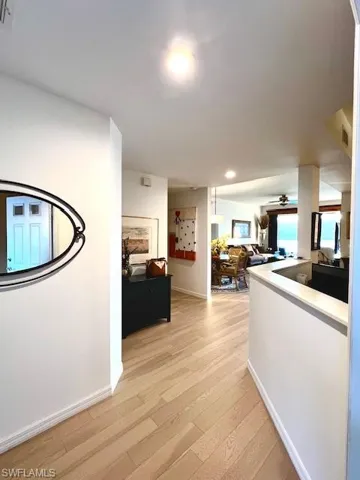 Spacious Foyer Entrance with Engineered Hardwood Flooring.