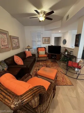 Den w/Engineered Hardwood Floor & Plantation Shutters & Fan