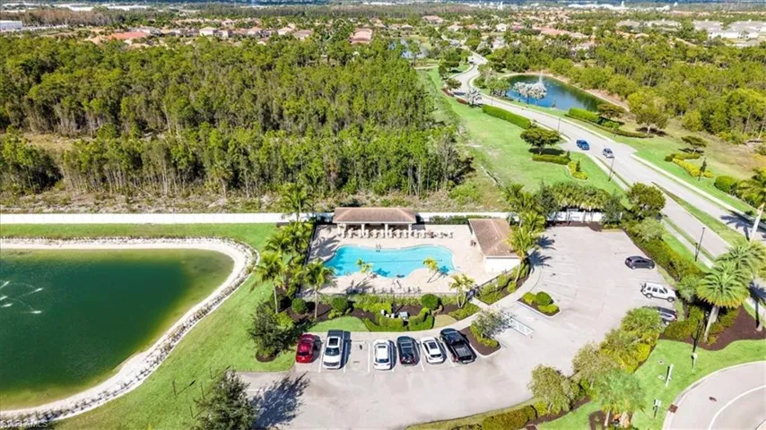 Bird's eye view of a large body of water and a pool area