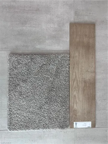 Tile in main areas +flex and master Carpet in secondary bedrooms