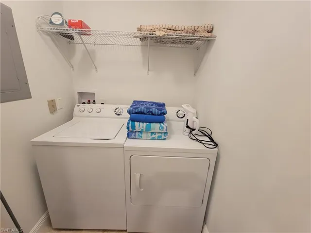 Washroom featuring independent washer and dryer and hookup for a washing machine