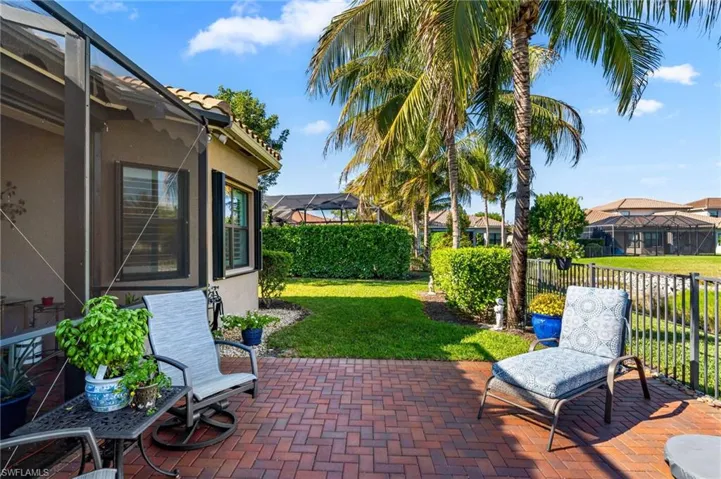 Huge bonus patio features a fence to secure your four legged friends