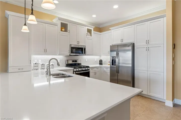 Pantry is finished with cabinetry doors