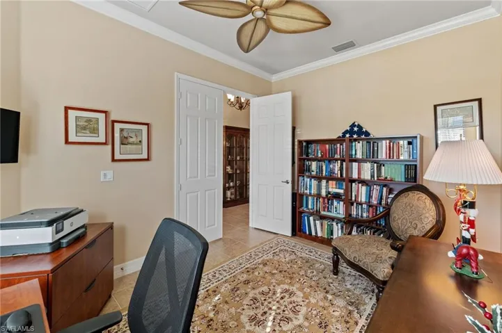 Den is located off foyer