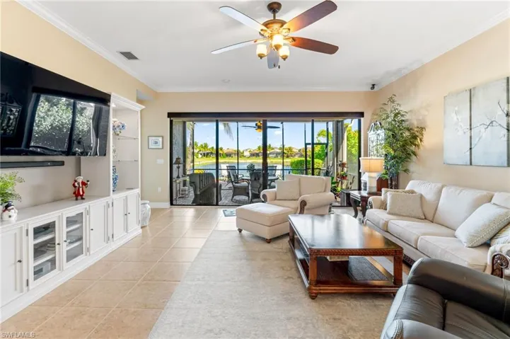 Living room features crown molding
